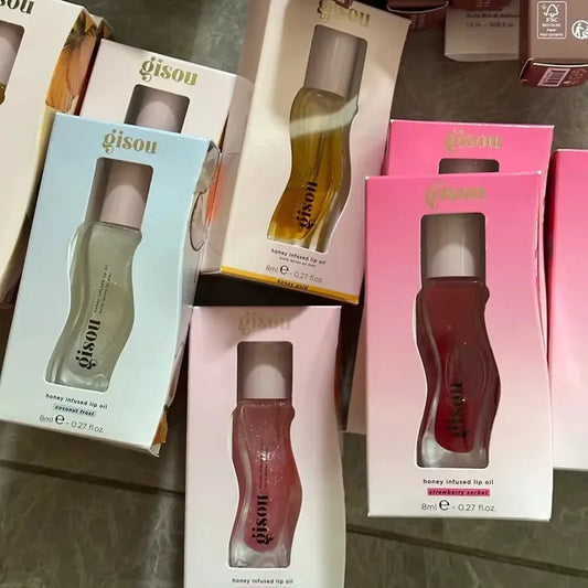 Flacon du gloss Lève Gisou avec effet brillant visible