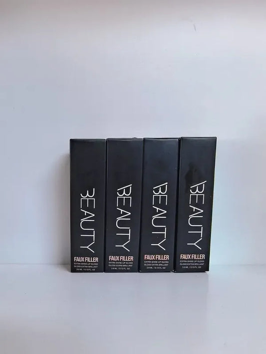 Applicateur du gloss à lèvres montrant la texture brillante